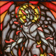 The mysterious signal Angel, rendered in the stained glass of the New Eden church.